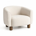 Poltrona imbottita bouclé crema con schienale curvo e gambe in legno 78 x 75 x 72 cm
